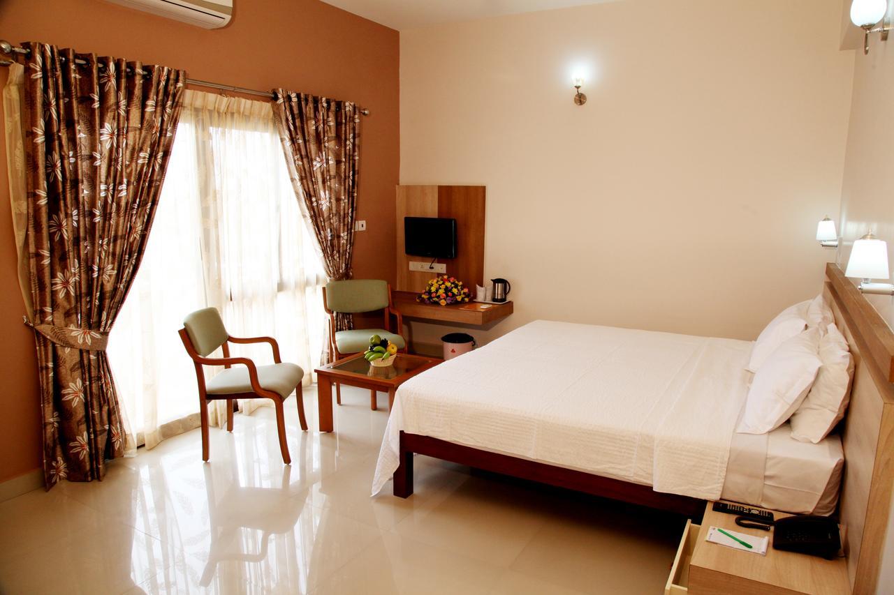 Hotel Polariz Parassinikkadavu Zimmer foto