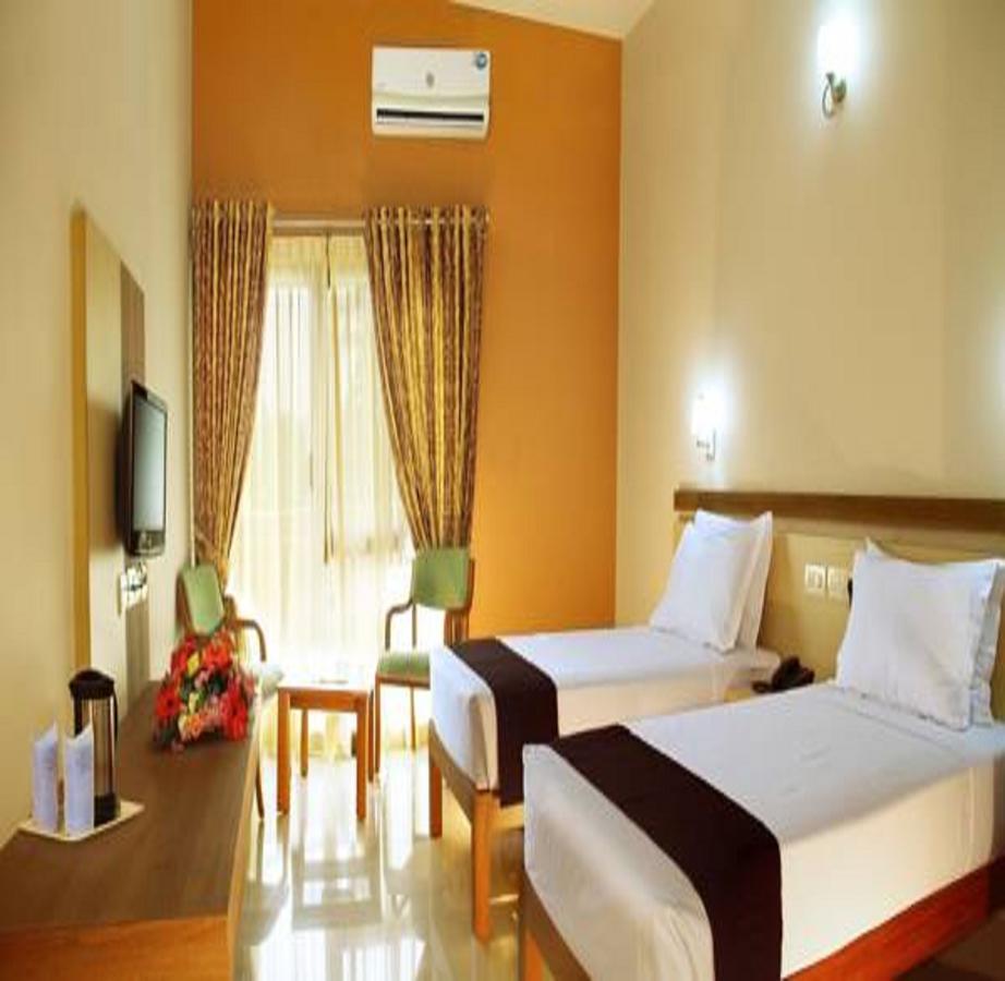 Hotel Polariz Parassinikkadavu Zimmer foto